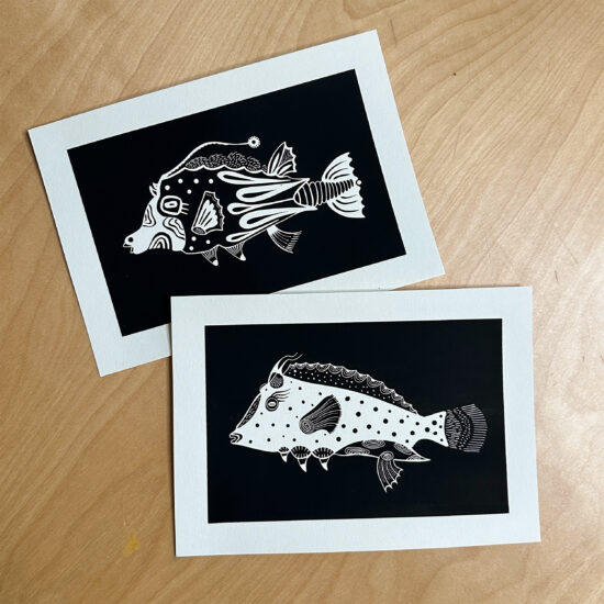 2 screenprints of black and white minimalistic fishes with an abstract character